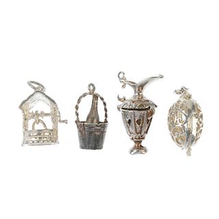 A selection of seventy-six assorted charms. To include a Holy Bible, opening to reveal pages contain