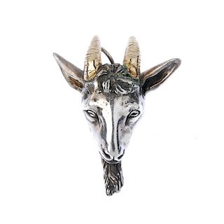 A silver bi-colour rams head pendant. The rams head, with textured horns, to the plain surmount. Mak