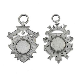 A selection of silver and white metal jewellery. To include six shield-shape medallions, two with in