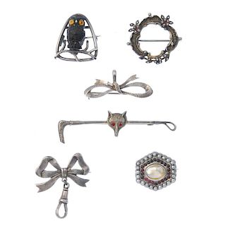 A selection of silver and white metal jewellery. To include a late Victorian bird and shell brooch,