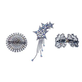 BUTLER & WILSON - four items of jewellery. To include a brooch in the shape of a butterfly and set w