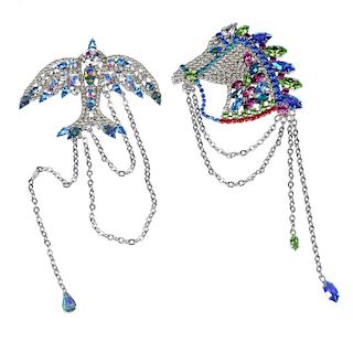 BUTLER & WILSON - four brooches. To include a brooch designed as a fish, the tail set with blue past