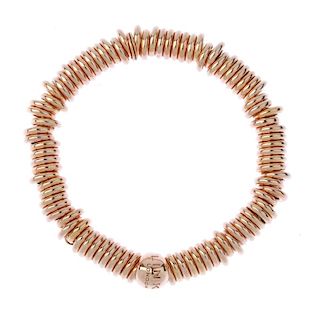 LINKS OF LONDON - a rose gold vermeil silver 'Sweetie' charm bracelet. With rose gold vermeil silver