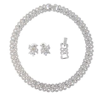 SWAROVSKI - a necklace and earring set. The necklace designed as a series of interlinking lines of c