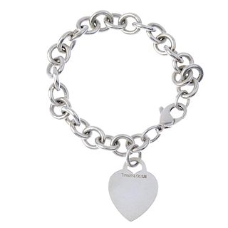 TIFFANY & CO. - a bracelet. The belcher-link chain suspending a heart-shape charm. Signed Tiffany &