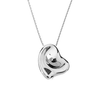 TIFFANY & CO. - an Elsa Peretti heart pendant and chain. The chain suspending a heart-shape pendant