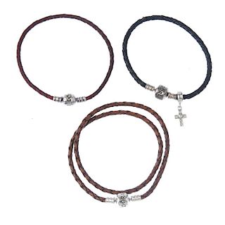 A selection of designer jewellery. To include three Pandora plaited leather bracelets, one brown and