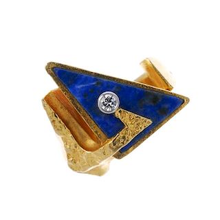 LAPPONIA - an 18ct gold lapis lazuli and diamond ring. Designed as a two angular panels, one set wit