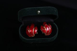 A pair of Trifari enamel ear clips