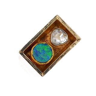 A Scandinavian opal and diamond ring. Designed as a rectangular panel with a circular-cut opal doubl