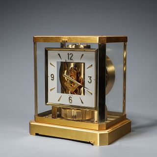 A copper pneumatic table clock