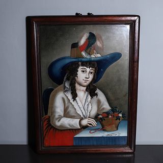 A rosewood-framed portrait