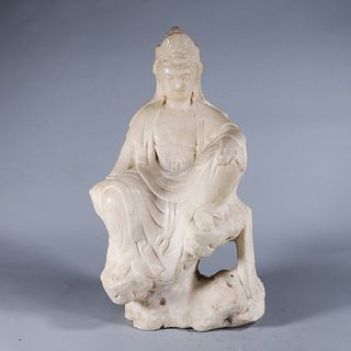 A white jade Guanyin statuette
