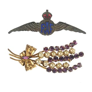 A selection of costume jewellery brooches. To include a winged RAF brooch, the letters enamelled in
