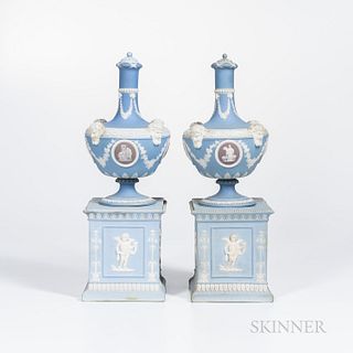 Pair of Wedgwood Tricolor Jasper Barber Bottles on Plinths, England, 19th century, the barber bottles with a light blue ground, lilac medallions and a