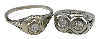 Two 14 Karat White Gold Filigree Rings, to include one set with two round diamonds, each 4.3 millimeters, size 2 1/2; along with one set with single d