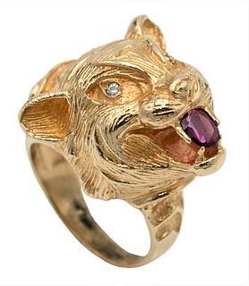 14 Karat Gold Ring, in form of lions head, having diamond eyes and red stone in mouth, size 6, 22.2 grams.