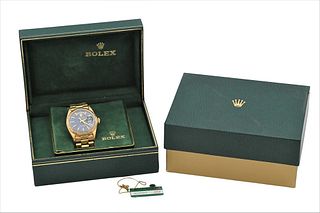 Rolex 18 Karat Gold Men's Wristwatch, President Day-Date, in original box with original tag, 119.9 grams total weight.
