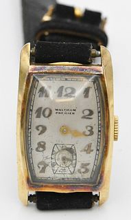 14 Karat Waltham Premier Vintage Rectangular Wristwatch, (hour hand missing), 21.5 x 28.6 millimeters.
