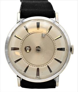 LeCoultre 14 Karat White Gold Men's Wristwatch, having small diamonds for hands, 32.5 millimeters.