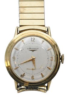 14 Karat Gold Longines Men's Vintage Wristwatch, having second hand, 33.5 millimeters.