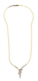 14 Karat Gold Necklace, having drop with 13 diamonds, length 16 inches, 17.1 grams.