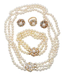Pearl Four Piece Set, to include a pair of 14 karat gold earrings set with center pearl and floral diamond surround, with matching ring and matching c