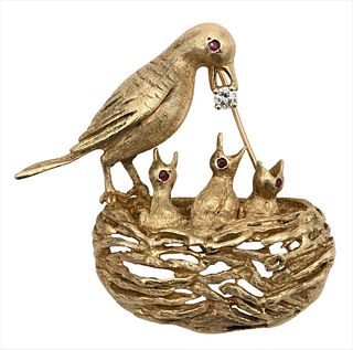 14 Karat Gold Brooch, bird feeding babies, having small diamond and ruby, 1 3/4 inches, 21 grams.