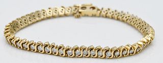 14 Karat Gold and Diamond Inline Bracelet, 54 diamonds, length 7 inches, 17.8 grams.
