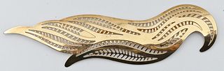 Taubes 14 Karat Bird Style Brooch, perforated, length 4 3/8 inches, 7.2 grams.