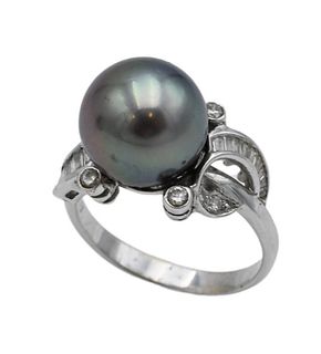 18 Karat White Gold Ring, set with grey pearls flanked by round and baguette diamonds, size 6 1/4, 6 grams.