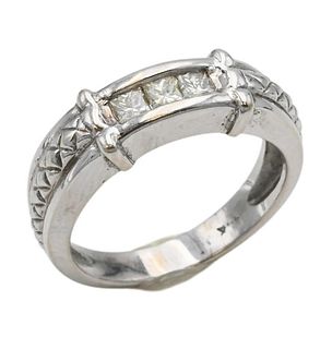 14 Karat White Gold Ring, set with four princess cut small diamonds, size 7, 5.8 grams.