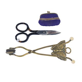 A selection of mainly late 19th century accessories. To include a late Victorian skirt lifter with b