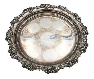 Mauser Sterling Silver Round Tray, with floral border, diameter 13 1/8 inches, 28.3 t.oz. Provenance: An estate from Redding, CT.