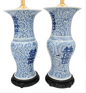 Pair of Chinese Blue and White Porcelain Baluster Vases, early 20th century, each mounted as a lamp, height 15 5/8 inches.