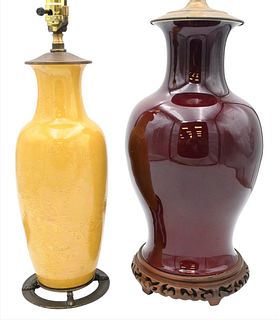 Two Chinese Glazed Vases, to include a yellow glaze vase having incised flowers and bird design, height 13 1/2 inches; along with a red glazed lobed v