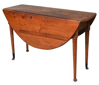 Queen Anne Maple and Tiger Maple Table, having oval drop leaves, circa 1750, (restored), height 27 1/2 inches, width (top closed) 15 inches. Provenanc
