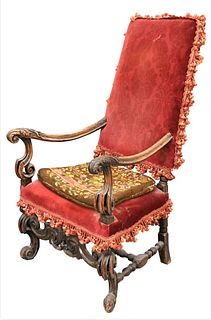 Continental Walnut Armchair, having openwork carved arms and legs with turned stretchers, probably 18th century, height 48 inches. Provenance: Estate 