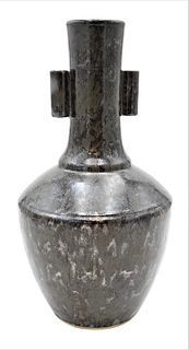 Chinese Porcelain Vase, 19th century, bulbous body or rotating shape and tubular neck handles, covered overall with ain "iron rust" splashed glaze, he