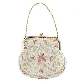 Seven evening bags. To include an early 20th century bag, designed with delicate floral embroidery a