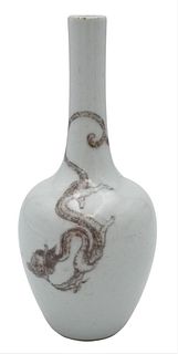 Chinese Underglaze Copper Red Dragon Vase, 19th century, bottle shape and for the scholar's table, unmarked, height 7 1/2 inches.
