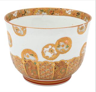 Small Painted Japanese Kutani Bowl, 19th century, Meiji Period, in a deep conical shape; the interior painted with dragons and the exterior with float