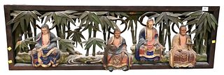 Large Carved Gesso and Painted Wall Panel, having four seated buddha amongst bamboo trees, 17" x 52".
