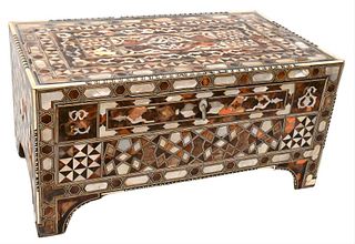 Tortoise and Mother of Pearl Inlaid Chest, having one drawer, missing some inlays, height 12 1/2 inches, width 24 inches, diameter 13 3/4 inches.