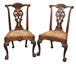 Pair of George III Mahogany Side Chairs, having carved gargoyle on crest over pierced splat, over needlepoint slip seats, set on carved cabriole legs 