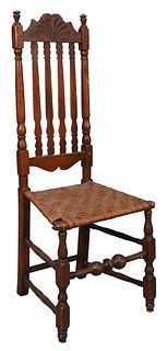 Bannister Back Side Chair, having carved crest with fan carving, rush seat, block and turned legs, in old finish, 18th century, height 44 inches, seat