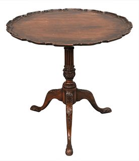 Chippendale Mahogany Tip Table, having piecrust edge on fluted and carved shaft, on tripod base with carved feet, height 28 1/2 inches, top 29 1/2" x 