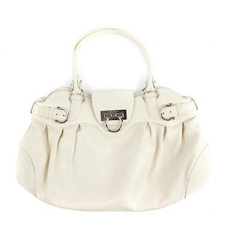 SALVATORE FERRAGAMO - a Marisa shoulder bag. In cream leather with silver-tone hardware, rolled shou