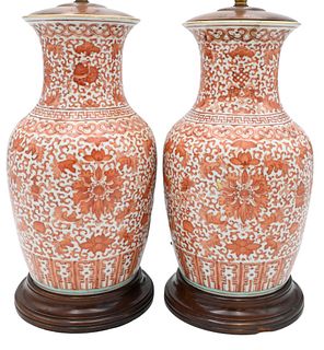 Pair of Chinese Porcelain Vases, having painted orange scrolling vines, foliage, and lotus flower design, made into table lamps, vase height 12 1/2 in