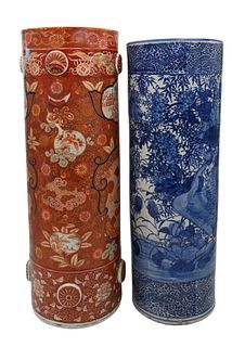 Two Japanese Umbrella Stands, 19th century, one blue and white transfer pattern; along with a red and gilt Kutani stand with imperial figural reserves